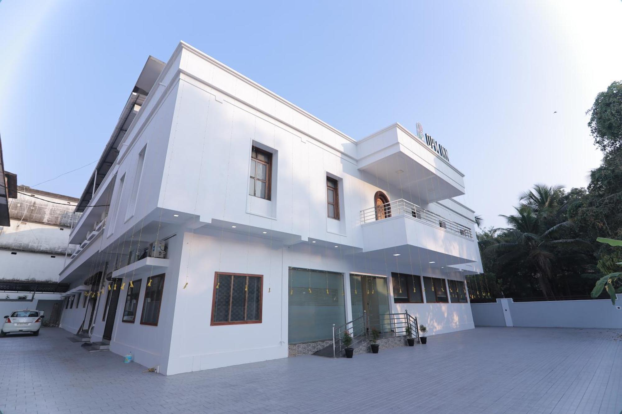Opm Inn Payyannur Buitenkant foto